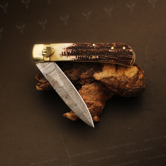 Damascus steel Push Button Stag Handle Folding Knife in Wooden Box. Pro1705