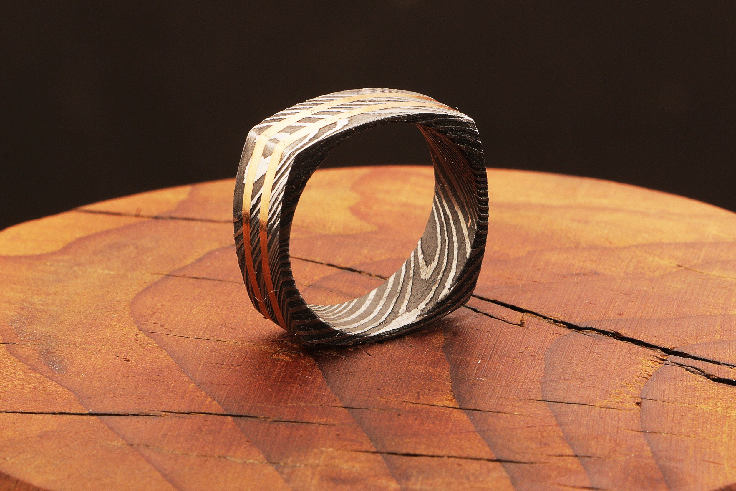 Enthralling Damascus steel Ring with Two Embedded Brass Lines in Unique Style. Pro-Regalo7016